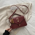 Minimalist burgundy crocodile pattern handbag with gold hardware and beaded charm - With Pendant / Red