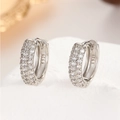 Macro shot of S925 sterling silver hoop earrings with triple-row pavé zircon stones - 17