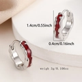 Detail view of 1.4cm cross earrings with silver metal and red enamel lava texture - Red Lava Texture Enamel Hoop Style / One Pair / Silver/Red