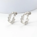 Detailed view of silver zigzag hoop earrings with cubic zirconia and screw backings - 31