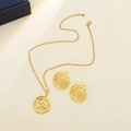 Golden jewelry set featuring spiral swirl necklace and earrings with polished finish - Polished Spiral Vortex Style (E6163-1)