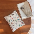 Quilted fabric cosmetic bag featuring colorful dog prints and simple wish label - Dog
