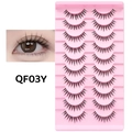 10 pairs of natural false eyelashes with clear bands shown on a pink tray with eye demo - Crossed Dense Style (QF03Y)