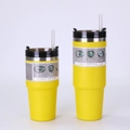 Detail of yellow stainless steel tumbler set featuring matte finish and 3-way lid design - 20oz / Yellow