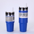 Detail view of dual-size blue insulated tumblers with 3-way lids and stainless steel bodies - Blue