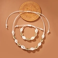 Bohemian style necklace and bracelet set featuring white and gold shell beads on rope - By0012 - Shell Bracelet And Necklace Set