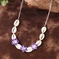 Bohemian beach necklace featuring natural white shells and purple plumeria flowers - Qnn0018 - Purple Seashell Necklace