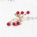 Fashion gold layered wire ring featuring elegant dark red pearls in a spiral design - One Size / Red
