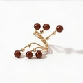 Adjustable spiral golden ring with six red-brown pearls in a modern geometric style - One Size / Coffee