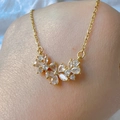 Golden flower pendant necklace with clear zircon stones on a stainless steel chain - 97#XL2161-10