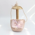 Macro detail of kids straw crossbody bag with large pink lace bow and pearl accents - Sequin Mesh Bow - Pink