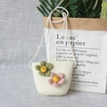 Detail of cream woven mini bag for girls with decorative floral accents and thin strap - Green & Pink Large Flower - Cream