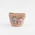 Detail of straw woven crossbody bag with cute plush smiley stars for little girls - Smiling Star - Pink