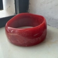 Irregular wide resin bangle with bold red marble texture and artistic design - Inner Diameter 67.2mm / Weight 67g / Red with White Silk