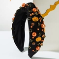 Halloween knot headband featuring orange pearls, black rhinestones, and pumpkin charms - Black Hat Pumpkin
