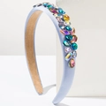 Cerchietto imbottito barocco con strass colorati su tessuto di raso azzurro - Blu