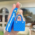 Blue EVA mini beach bag keychain featuring a Forever Sports wrist strap and gold metal ring - Klein Blue