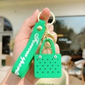 Mini green beach bag keychain featuring cute eye detail and Forever Sports wristlet - Green