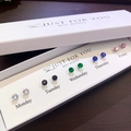 Detailed view of 7-day colorful round cubic zirconia earrings in a white gift box - Silver Five Color Zirconia Set (NS911-28) / 5 Pairs/Pack / Colorful Silver
