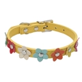 Close-up of yellow PU leather dog collar with colorful flower rivets and D-ring buckle - Yellow
