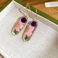 Close-up of handmade resin earrings featuring real pink and purple dried flowers - Earring Hooks / Pink-Purple
