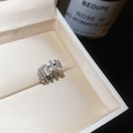 Close-up view of a luxury zircon-encrusted ear cuff in a box for non-pierced ears - Silver Letter Miu Ear Clip (4#) / Single Piece