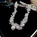 Close-up of vintage French pearl necklace with crystal beaded lace details - Style 28-White