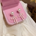 Detailed macro view of elegant pink bow-knot earrings with pearls and zircon stones - Pink Enamel Bowknot White Pearl Style (21#) / Silver Pink