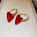 Elegant vintage-style gold hoop earrings with vibrant transparent red heart pendants. - 26# Heart Clip