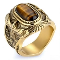 Vintage gold men's ring featuring an oval tiger's eye stone and eagle relief carvings - US 7 / Gold & Tiger's Eye