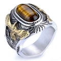 Vintage men's ring with oval tiger eye stone and golden eagle carving detail - Two-tone Gold & Tiger's Eye