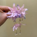 Detailed macro view of purple fabric flower earrings with long gold tassels and crystals - Silver Needle / Pink