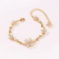 Elegant gold flower bracelet with sparkling crystal petals and adjustable lobster clasp - Gold-White