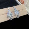 Detailed macro view of elegant silver chandelier earrings with sparkling zircon pendants. - Chandelier Tassel Style (37#)