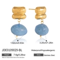 Detailed view of blue resin teardrop earrings with gold-plated stainless steel hardware - Drop Earrings (JDE0109029-BL)