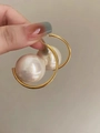 Close-up of elegant gold-plated oval pearl hoop earrings in vintage style - C-Shaped (12#) / Gold