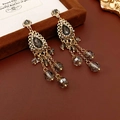 Vintage gold floral tassel earrings with smoky grey crystals and teardrop charms - Code 28 (Gold/Grey)