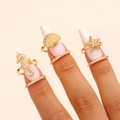 Detailed view of gold ocean-themed nail rings with seahorse, shell, and starfish zirconia - Ocean Style Set (94) / Three-Piece Set / Gold