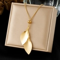 Golden double layer necklace featuring vintage leaf pendants and adjustable sliding bead - Double Leaf Adjustable Style (N4165)