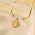 Gold herringbone chain with coin pendant and white zirconia accents on beige silk - Portrait Coin Necklace (QYH1080) / Gold