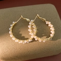 Detail of elegant 14k gold plated hoop earrings featuring lustrous white pearls. - Hoop Style (40#)