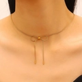 Gouden roestvrijstalen choker halsketting met strikontwerp en hangende kwastjes voor dames - Bowknot Clavicle Chain / Gouden Ketting