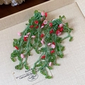Detailed view of green vine beaded earrings featuring pink and red acrylic flowers - Sweet Forest Vine Style (10#)