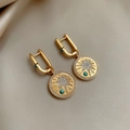 Close-up of 18K gold plated zircon sunburst earrings with turquoise stones on silk background - 18K真金电镀(HE31798) / Gold