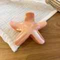 Elegant pink pearlescent starfish-shaped hair claw clip displayed on a white cloth - Pink Orange Pearlescent Starfish Hair Claw (59#) / Orange