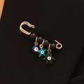 Broche imperdible dorado con cuentas negras y dijes de ojo turco y mano de Fátima - Oro-Cuentas Negras-Ojo Redondo Estrella Mano Negra