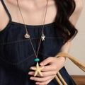 Stylish beach vacation necklace with starfish and conch charms on brown leather cord - Starfish Shape / Brown