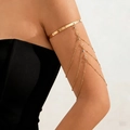 Elegant gold upper arm cuff bracelet featuring dangling chain tassels and crystal accents - Tassel Rhinestone Style (12297)