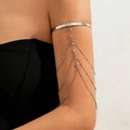 Silver bohemian arm cuff with hanging chains and crystal charms on female arm - Tassel Rhinestone Style (12296)