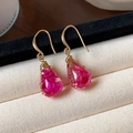 Elegant teardrop resin earrings with pink dried flowers and gold hooks - Gold-Pink